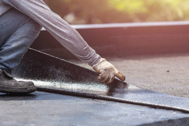 Professional Basement Waterproofing technician working in Lyons, NY